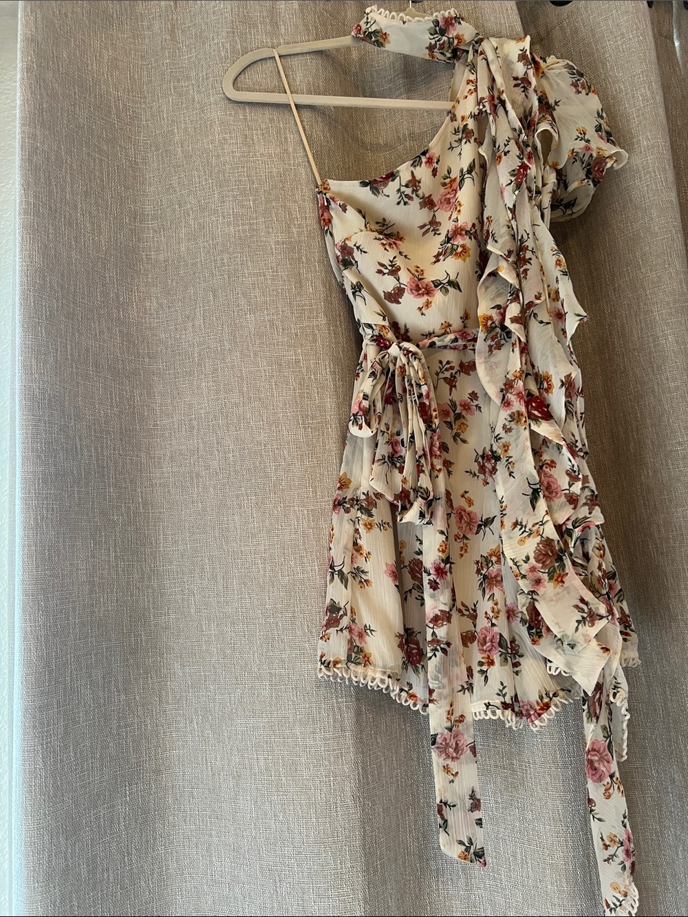 ASOS Cream Floral One-Shoulder Jumpsuit with Pink and Green Print.